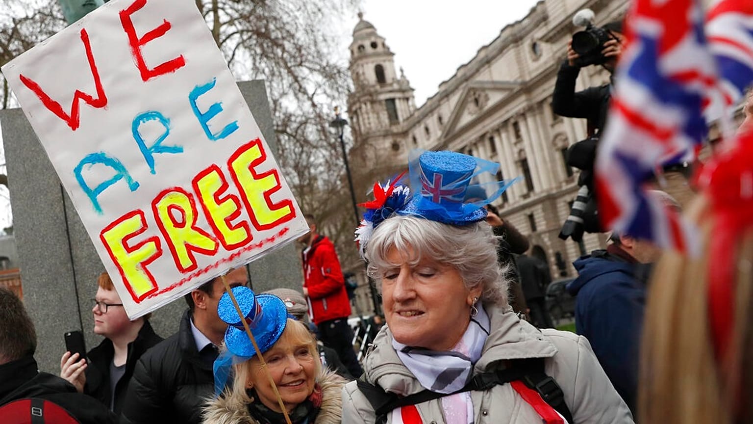 In this Friday, Jan. 31, 2020 file photo Brexiteers celebrate in London. 