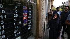An exchange shop displays rates for various currencies, in downtown Tehran, Iran