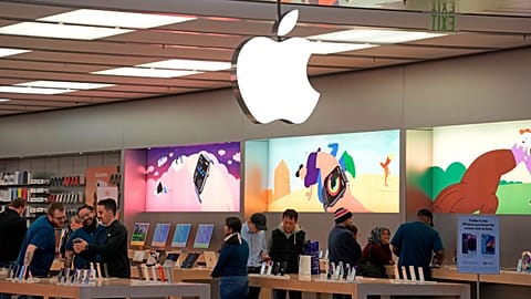 Customers shop in an Apple store in Pittsburgh, Pennsylvania, Jan. 30, 2023. 