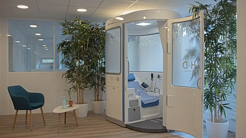 H4D's "Consult Station" is a hi-tech telemedicine booth where patients carry out their own physical exam while guided by a doctor on a video call.