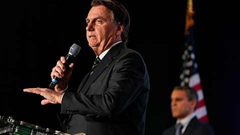 Brazil's former President Jair Bolsonaro speaks at an event hosted by conservative group Turning Point USA, at Trump National Doral in Miami.