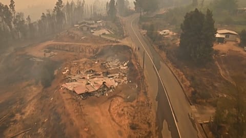 Aerial shot land devastated by forest fires in Chile.