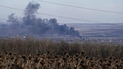FILE - Smoke billows during fighting between Ukrainian and Russian forces in Soledar, Donetsk region, Ukraine, Wednesday, Jan. 11, 2023.