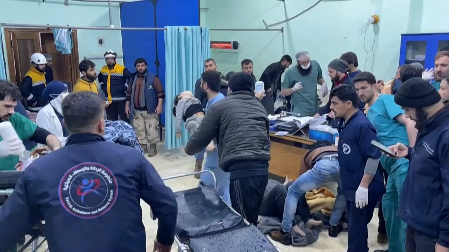 Victims being treated in the emergency ward of the Bab al-Hawa hospital following a deadly earthquake.