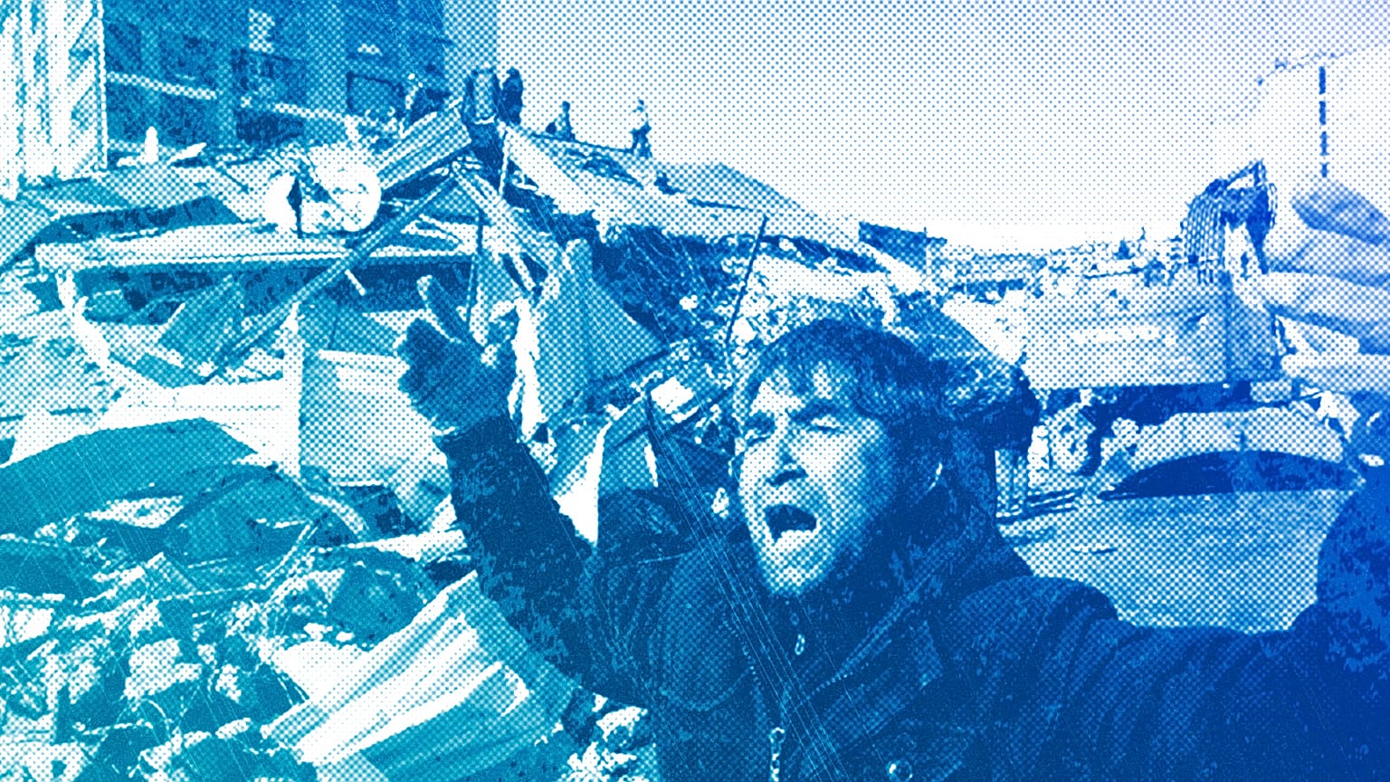 A man reacts after rescue teams found his father dead under a collapsed building, in Kahramanmaras, southern Turkey, 8 February 2023