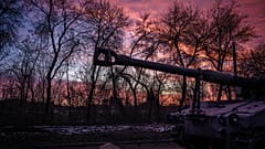 A Ukrainian self-propelled howitzer runs at sunset in the Donetsk region on February 9, 2023, amid the Russian invasion of Ukraine.
