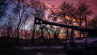 A Ukrainian self-propelled howitzer runs at sunset in the Donetsk region on February 9, 2023, amid the Russian invasion of Ukraine.