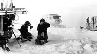 Antarctic scientists take scheduled soundings to determine the underlying structures of the area during a snowstorm