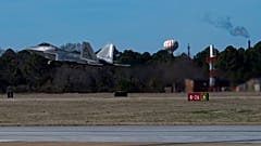 This photo provided by the U.S. Air Force shows a U.S. Air Force pilot taking off in an F-22 Raptor at Joint Base Langley-Eustis, Va., Saturday, Feb. 4, 2023.