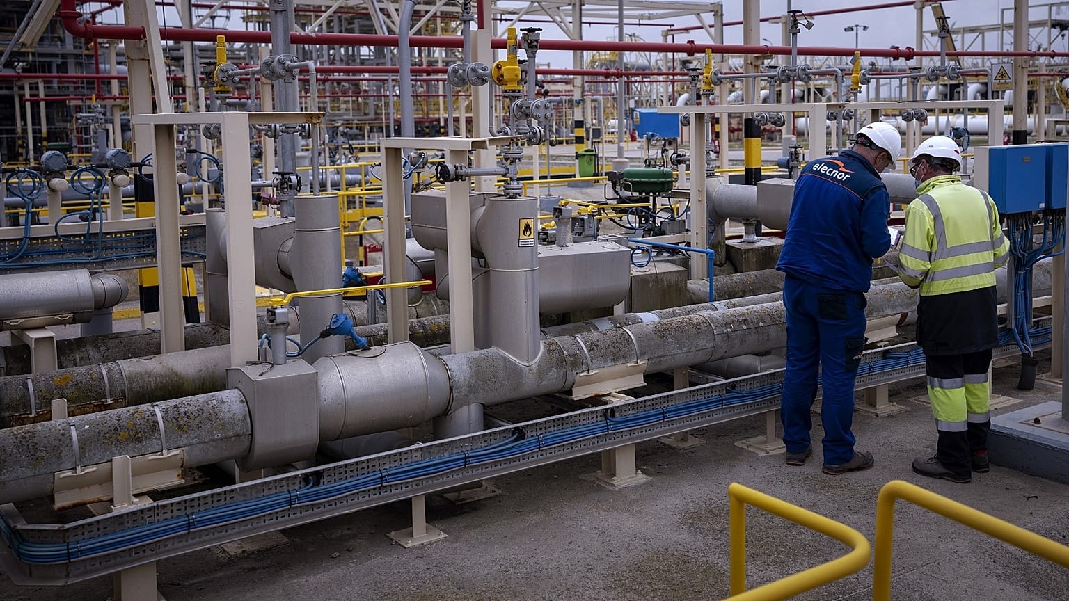 Operators work at Enagas regasification plant, the largest LNG plant in Europe, in Barcelona, Spain, March 29, 2022.