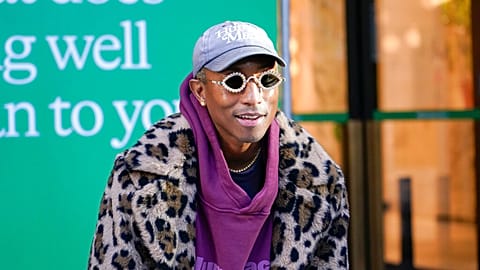 US artist Pharrell Williams poses for photographers during a photo call, outside Selfridges, in London, Friday, Nov. 25, 2022.