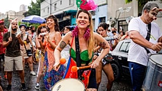 Revelers take part in the "Broco Burocra" or "bureaucracy" street block party in Sao Paulo, Brazil, Saturday, Feb. 11, 2023.