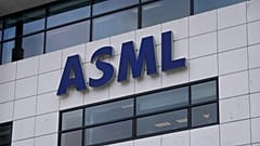 The logo of ASML, a leading maker of semiconductor production equipment, hangs on the head office in Veldhoven, Netherlands