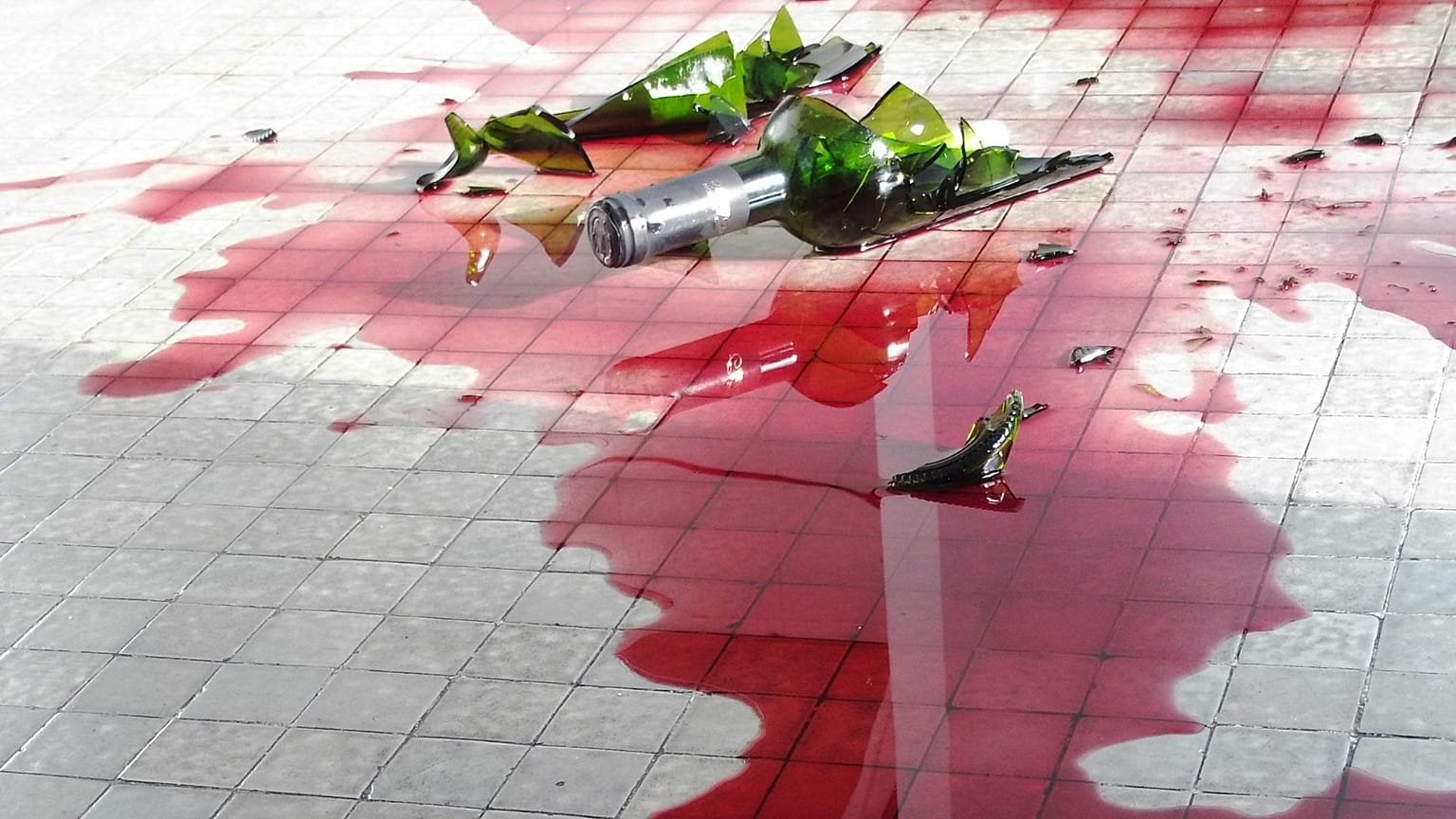 A spilled bottle of wine