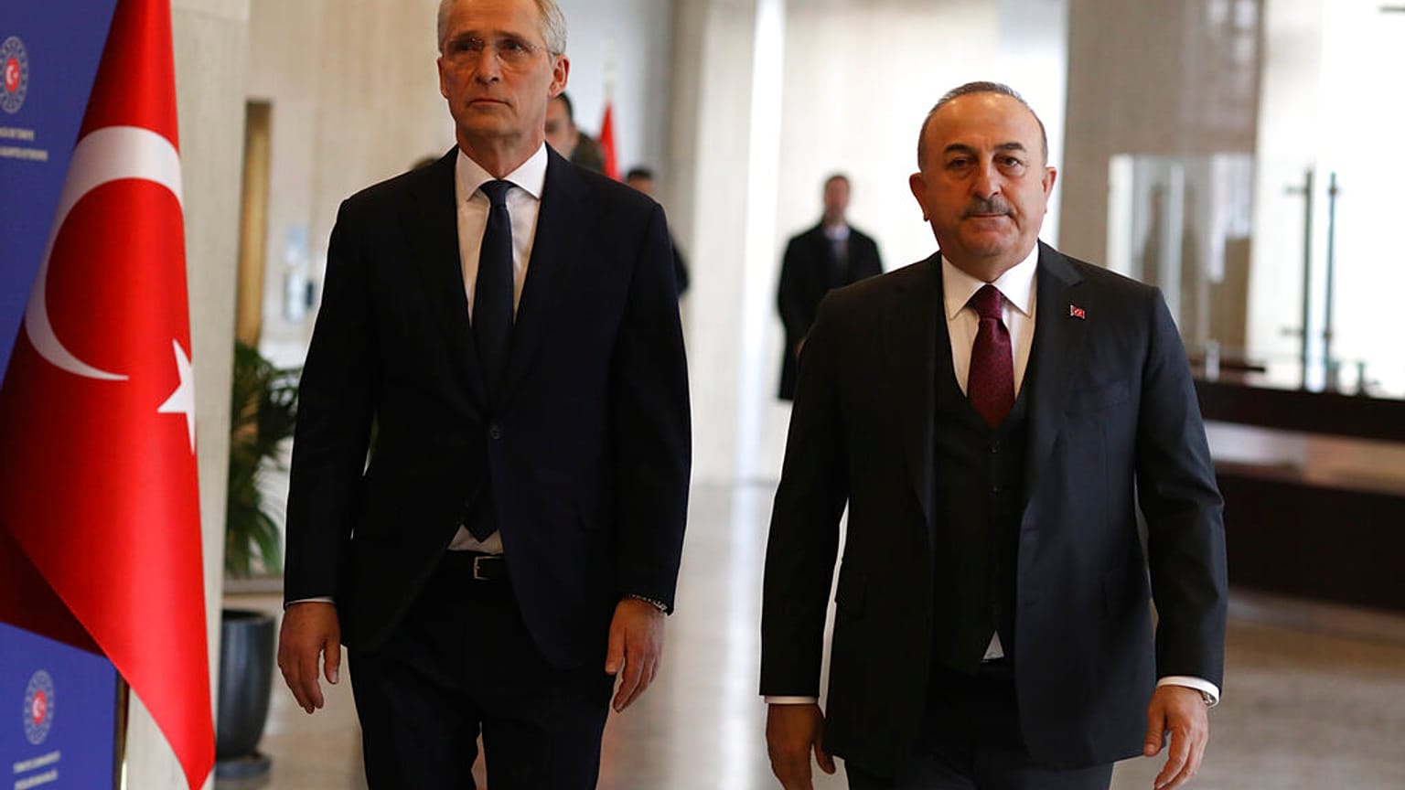 Turkey's Foreign Minister Mevlut Cavusoglu, right, NATO Secretary General Jens Stoltenberg arrive for a joint press conference in Ankara, 16 February 2023
