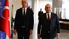 Turkey's Foreign Minister Mevlut Cavusoglu, right, NATO Secretary General Jens Stoltenberg arrive for a joint press conference in Ankara, 16 February 2023