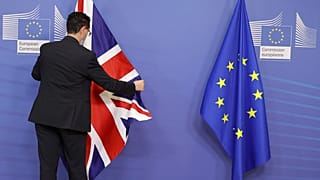 EU and Union flag prior to an official greeting between EU Commissioner Maros Sefcovic and f0ormer UK Foreign Secretary Liz Truss, in Brussels, Feb. 21, 2022.