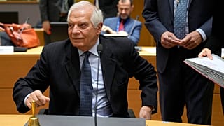 European Union foreign policy chief Josep Borrell rings a bell to signify the start of a meeting of EU foreign ministers at the European Council building in Brussels on 20 Feb