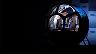 A two-seater cabin that a startup company says is capable of rising to an altitude of 24 km is displayed in Tokyo, Japan.