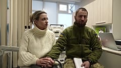 Ukrainian soldier Vitalii Khroniuk and his wife, Anna Sokurenko at the fertility clinic in Kyiv, Ukraine.