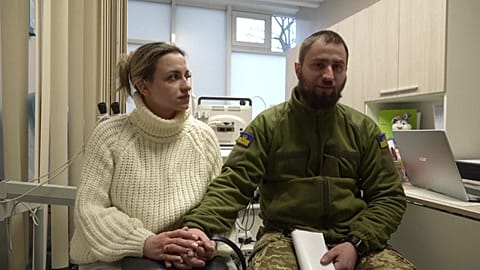 Ukrainian soldier Vitalii Khroniuk and his wife, Anna Sokurenko at the fertility clinic in Kyiv, Ukraine.