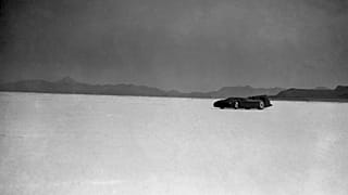 Sir Malcolm Campbell roaring across the Bonneville Salt Lake Flats, Utah, USA in his Bluebird car during his record breaking run of 301.337 miles per hour on September 3, 1935