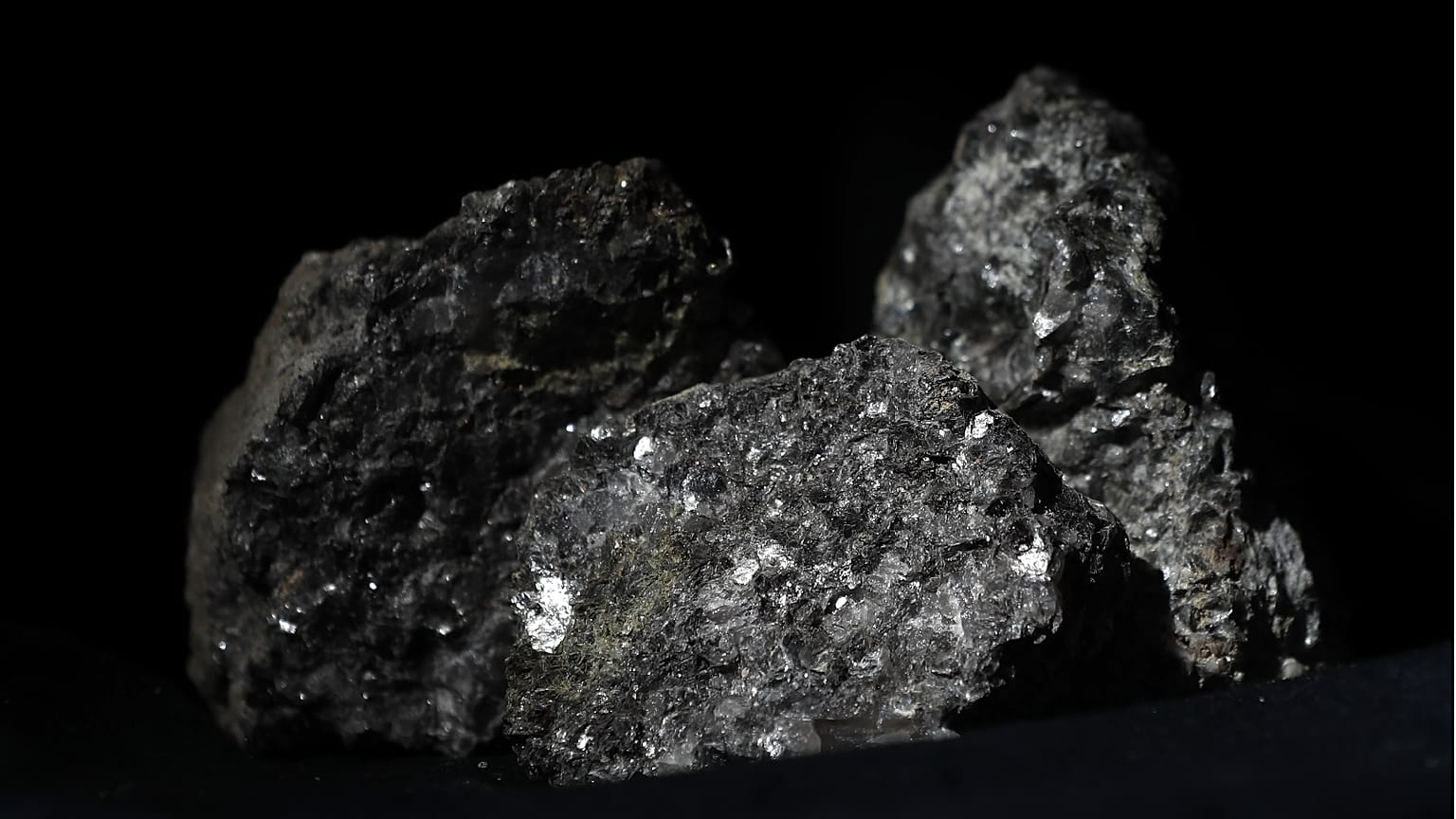 Pieces of lithium sparkle in an ore sample in Prague, Czech Republic, on March 28, 2017.