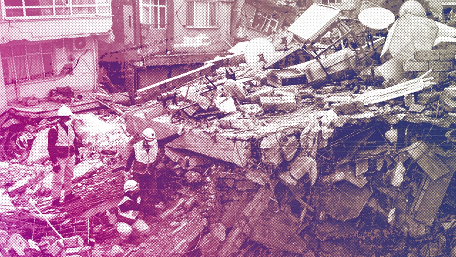 Greek and Turkish rescuers are at work to extract bodies of victims from the rubble of a collapsed building in Antakya, 15 February 2023