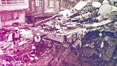 Greek and Turkish rescuers are at work to extract bodies of victims from the rubble of a collapsed building in Antakya, 15 February 2023