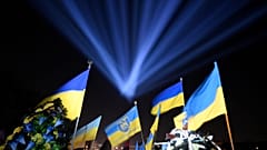 A symbolic "ray of memory" illumination at the graves of Ukrainian soldiers who died in the Russia's war at Lychakiv Cemetery in Lviv, Ukraine, February 23, 2023.
