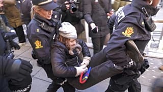 Greta Thunberg was carried away by police during a protest in Oslo on Wednesday