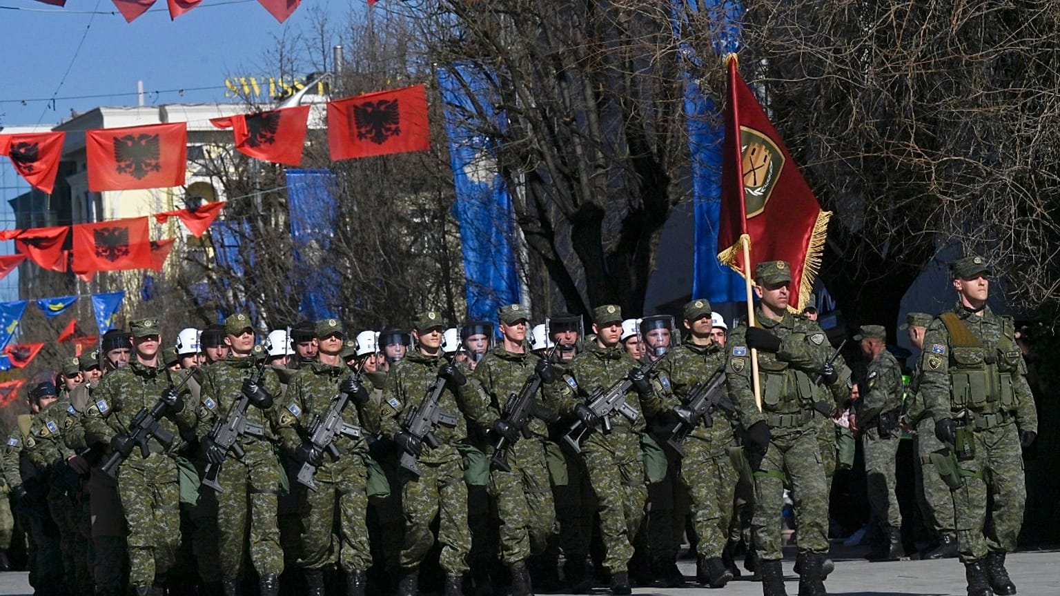 Kosovo Security Force members march during celebrations to mark the 15th anniversary of independence, in Pristina, Kosovo, Friday, Feb. 17, 2023. 