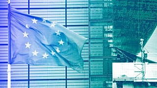 A new banner about the EU economic recovery package is being unveiled on the front of the Berlaymont building, May 2021