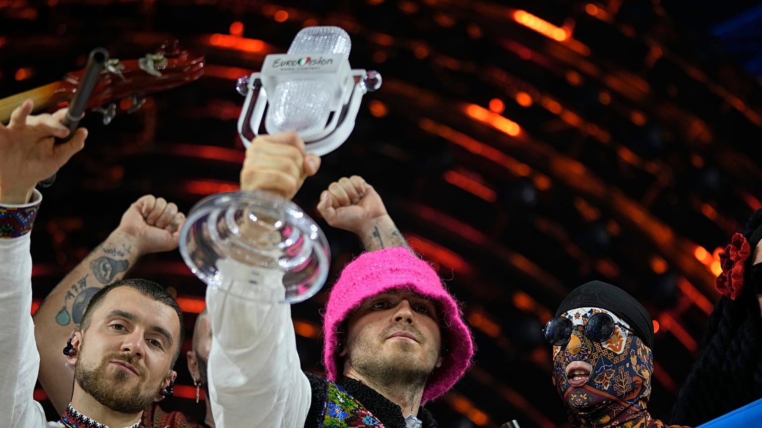 Members of the Kalush Orchestra from Ukraine celebrate after winning the Grand Final of the Eurovision Song Contest in 2022