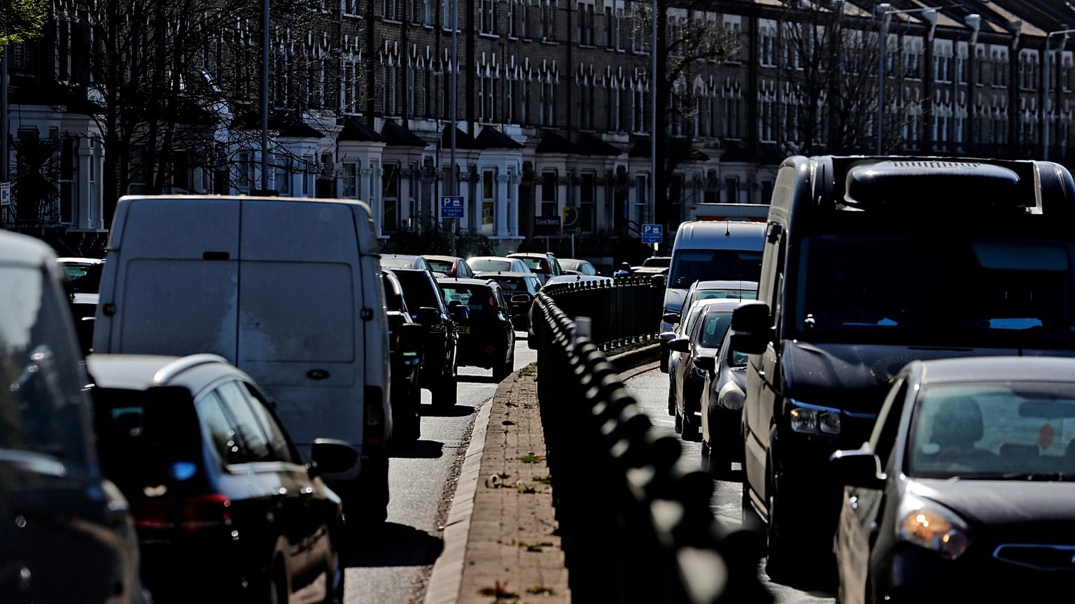 Cars queue in traffic on the main road A4 in London.
