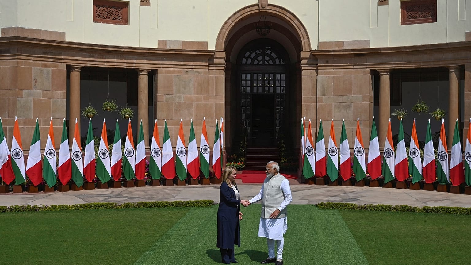 Italian Premier Giorgia Meloni, left, and Indian Prime Minister Narendra Modi, pose for the media before their meeting in New Delhi, India, Thursday, March 2, 2023.