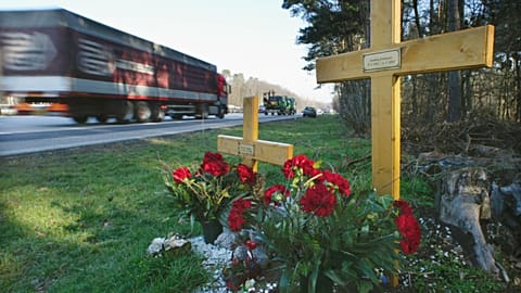 FILE: Crosses next to A5 autobahn near Karlsruhe mark the site of a fatal car crash, July 14, 2003