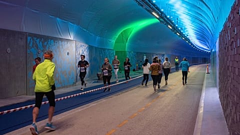 Artwork and installations line the tunnel in Bergen.