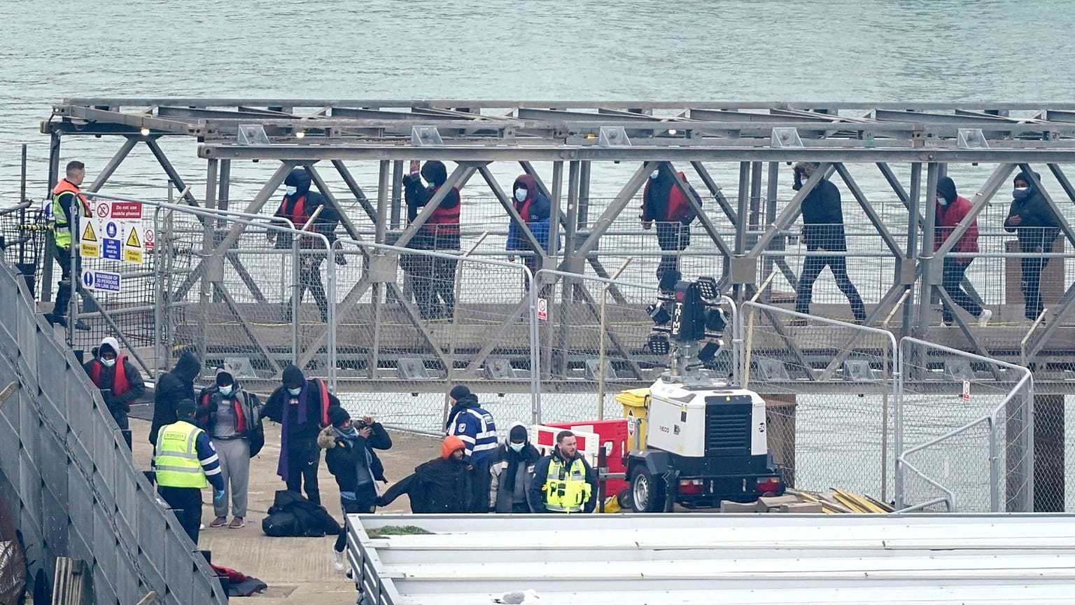 People believe to be migrants, onboard a Border Force vessel following a small boat incident in the Channel, England, Monday March 6, 2023.