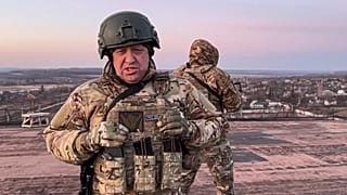 In this handout photo taken from video released on March 3, 2023, Yevgeny Prigozhin, the owner of the Wagner Group stands at an unspecified location in Ukraine.
