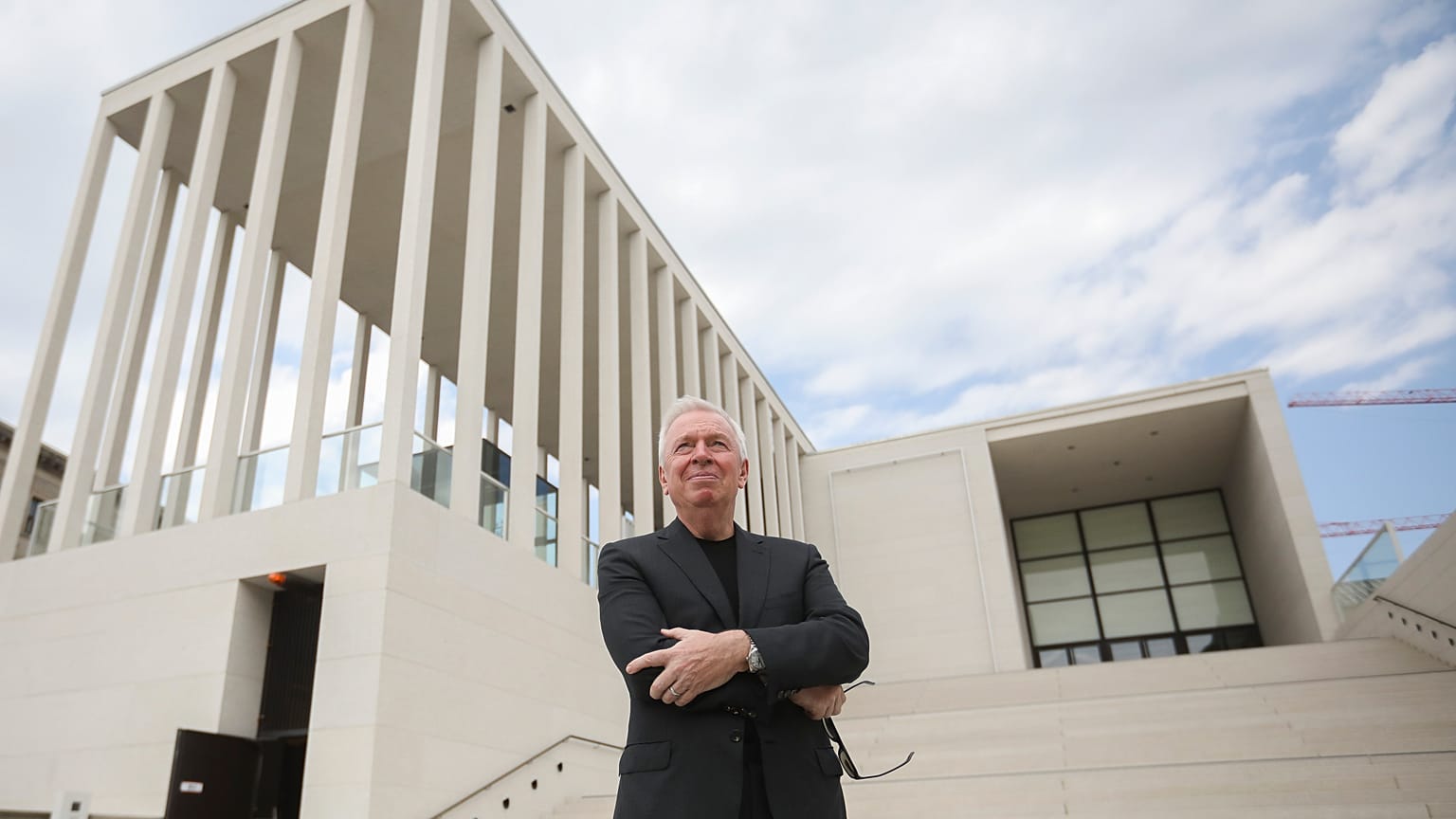Architect David Alan Chipperfield poses outside of the James-Simon-Galerie at the 'Museumsinsel', Museums Island, in Berlin, Germany, on July 1, 2019. 