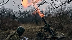 Volunteer soldiers fire towards Russian positions close to Bakhmut, Donetsk region, Ukraine, Wednesday, March 8, 2023.