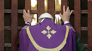 FILE — Pope Francis opens the holy door of the Bangui cathedral, Central African Republic, to open his yearlong Jubilee of Mercy, on Nov. 29, 2015.