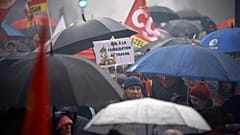Des manifestants à Paris, le 9 mars 2023