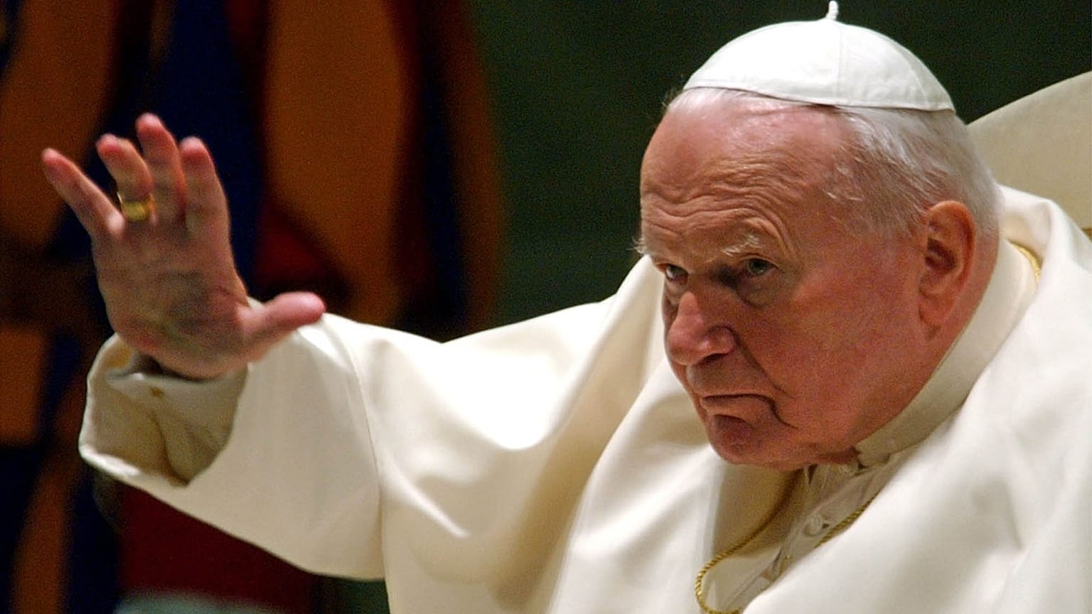 Pope John Paul II gives his blessing during his weekly General Audience in Paul VI Hall at the Vatican, Wednesday, July 21, 2004. 