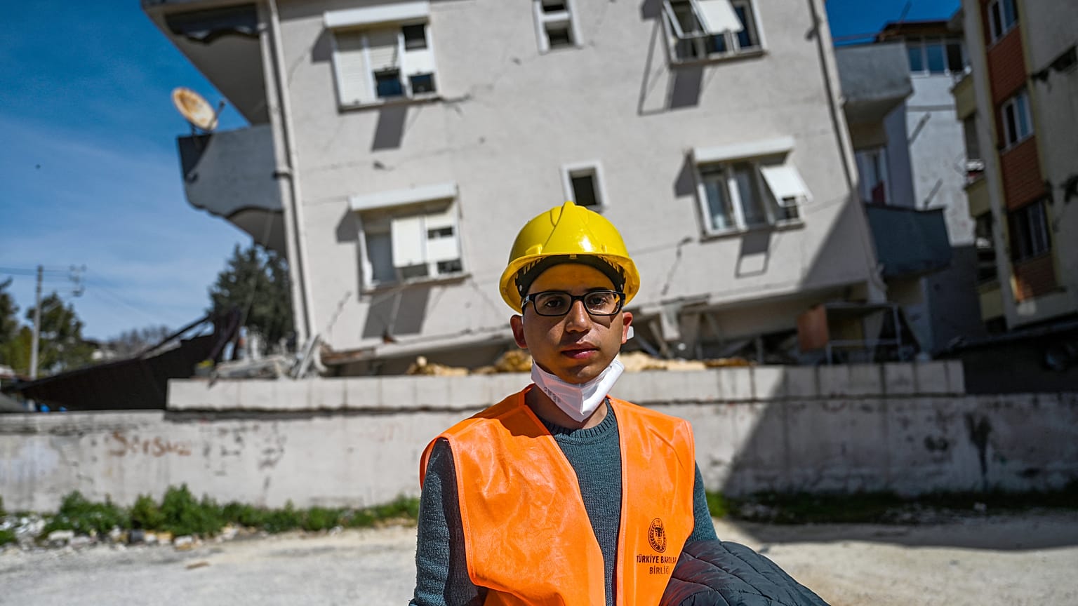 Ahmet Kandemir, a lawyer from antakya bar poses as he collects evidence frrom collapsed and damaged buildings in Hatay on March 7, 2023.