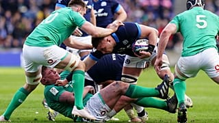 Scotland's Matt Fagerson, centre, is tackled, during the Six Nations rugby union international match between Scotland and Ireland at BT Murrayfield Stadium, in Edinburgh.