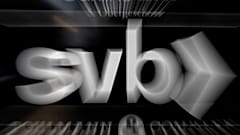 A sign of a branch of the Silicon Valley Bank is pictured at an office building where the bank is located in Frankfurt, Germany, Monday, March 13, 2023.