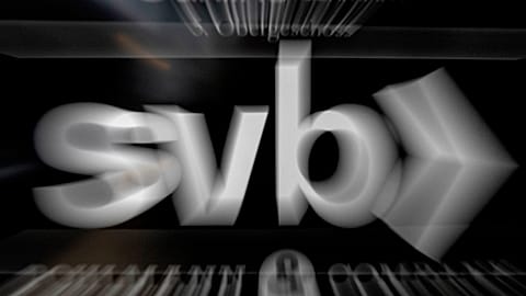 A sign of a branch of the Silicon Valley Bank is pictured at an office building where the bank is located in Frankfurt, Germany, Monday, March 13, 2023.