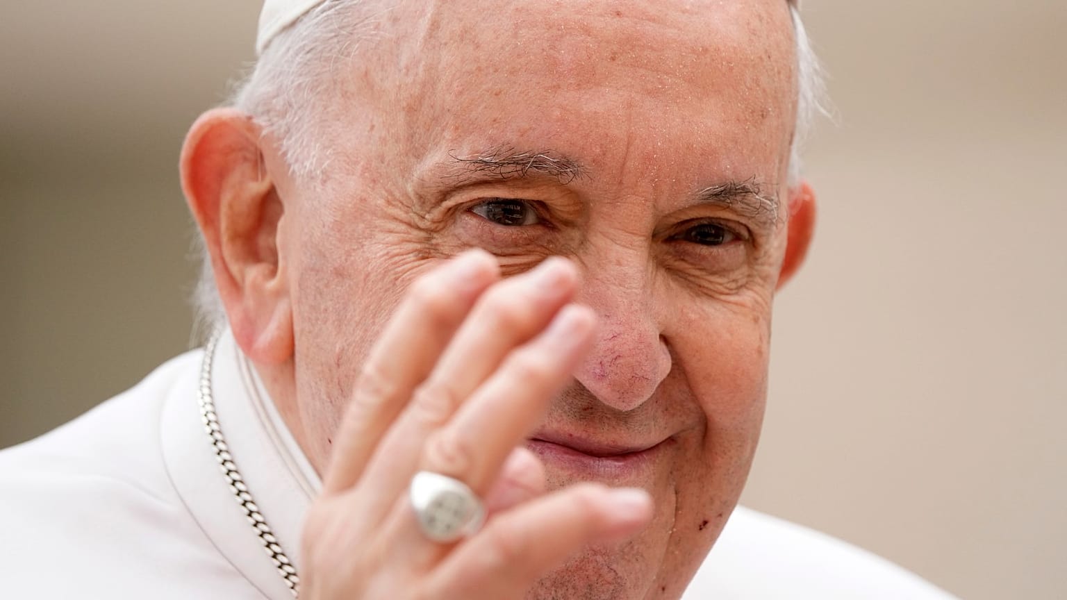 Pope Francis waves to faithful at the end of his weekly general audience in St. Peter's Square at The Vatican, Wednesday, March 8, 2023.